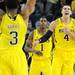 Michigan freshman Mitch McGary beats his chest as he celebrates a play against North Carolina State at Crisler Center on Tuesday night. Melanie Maxwell I AnnArbor.com